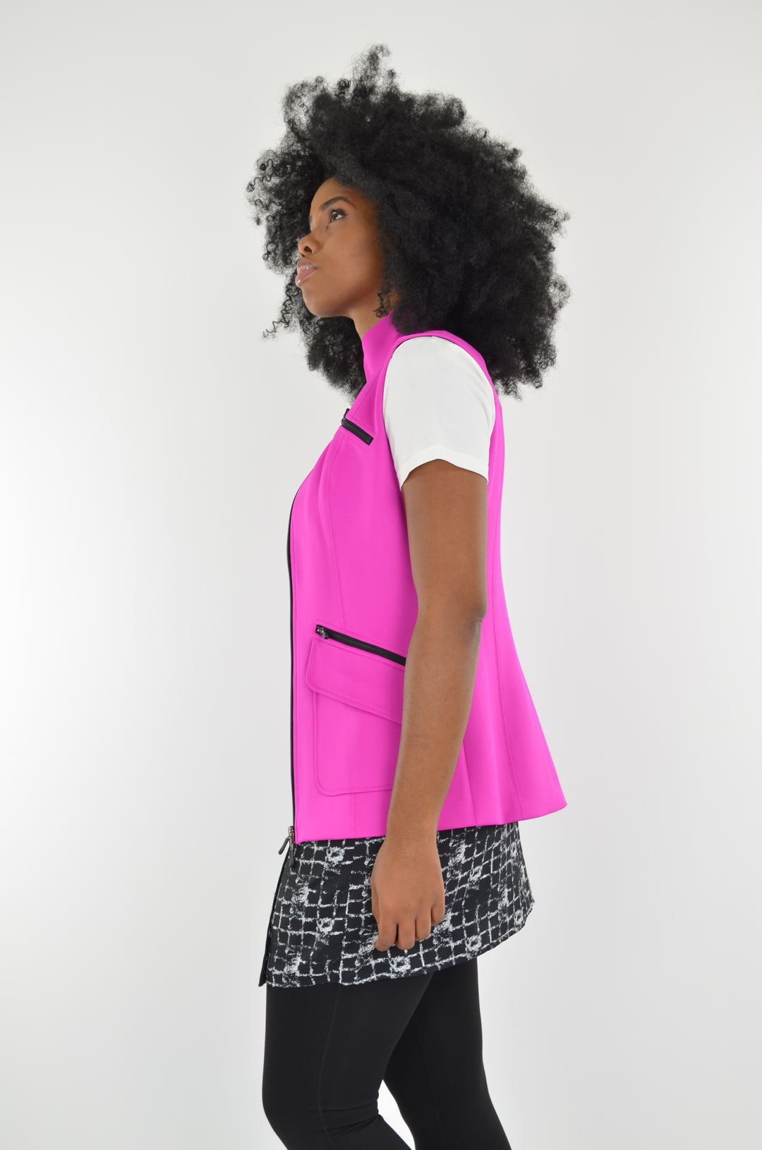 Marolli Pink Vest. This sleeveless vest is specifically designed to flatter. The special zipper details and collar give it a sporty and feminine look.  The high-quality material is extremely comfortable, breathable, and has moisture wicking properties to help keep you cool and dry. Goes great with many different color tees for that fashionable sporty look.